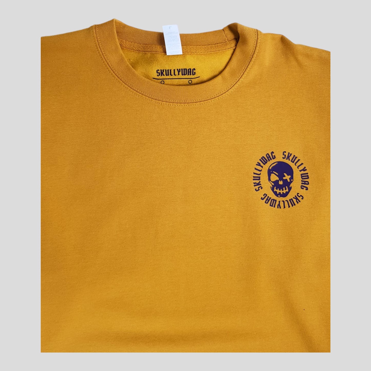 Ochre sweater/aubergine logos