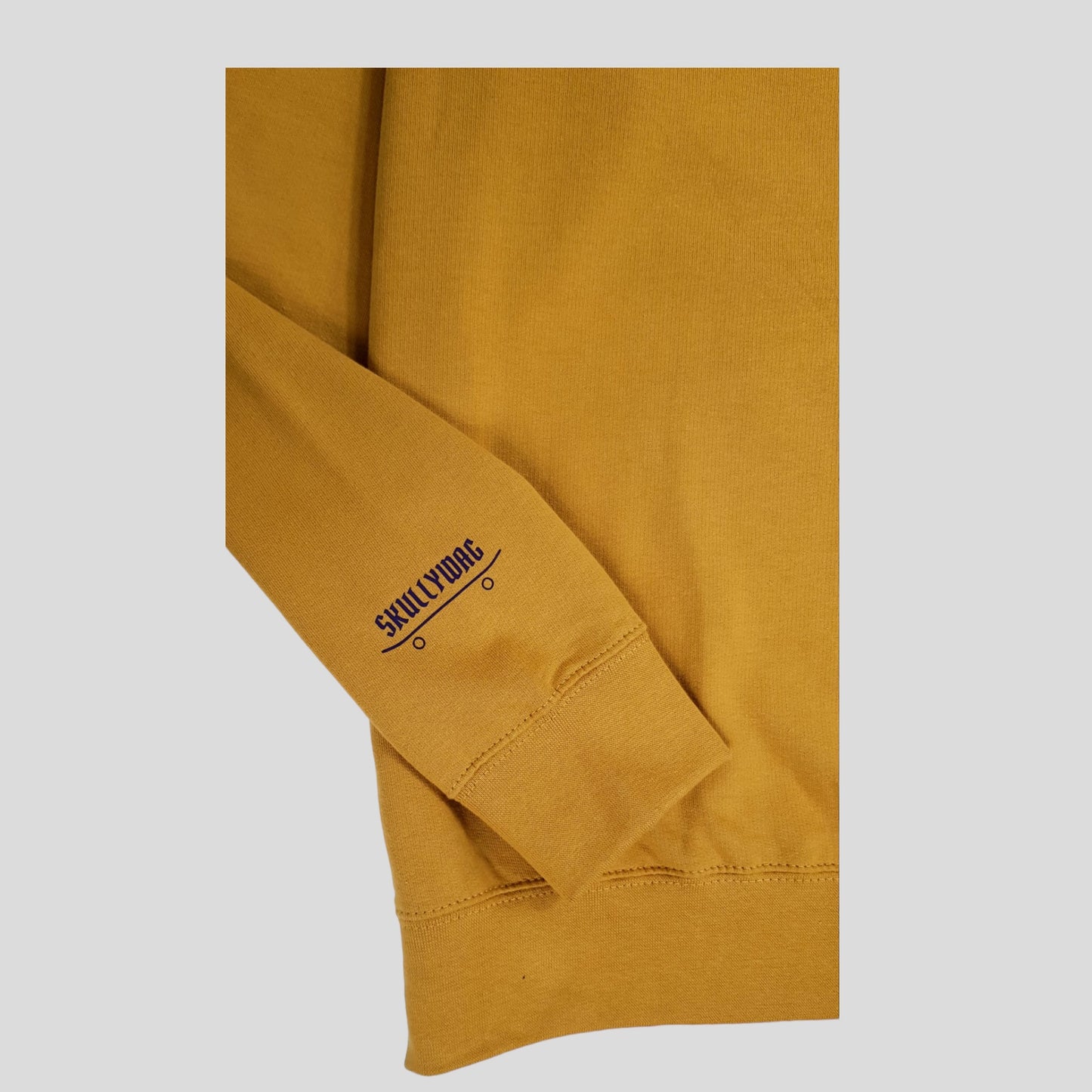 Ochre sweater/aubergine logos