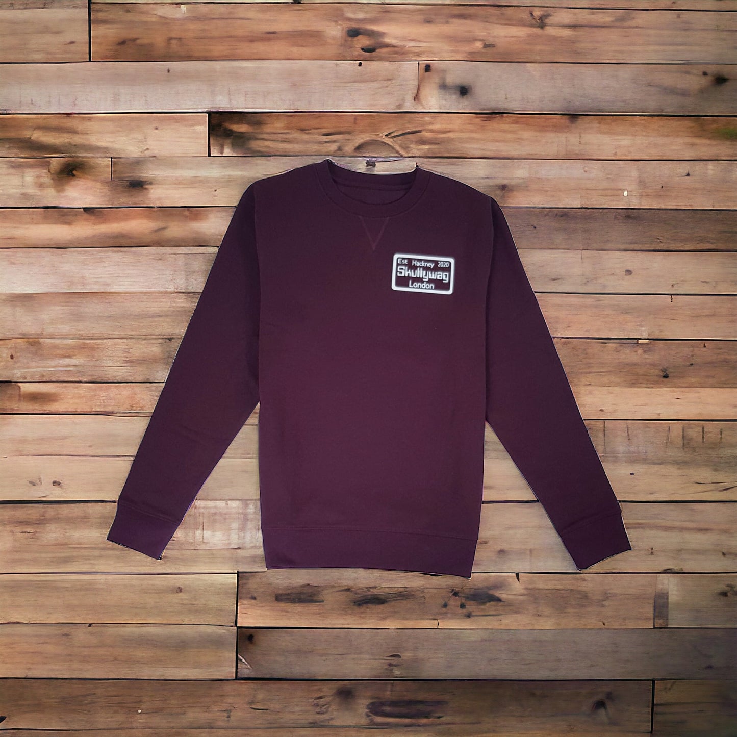 Maroon sweater/white logo