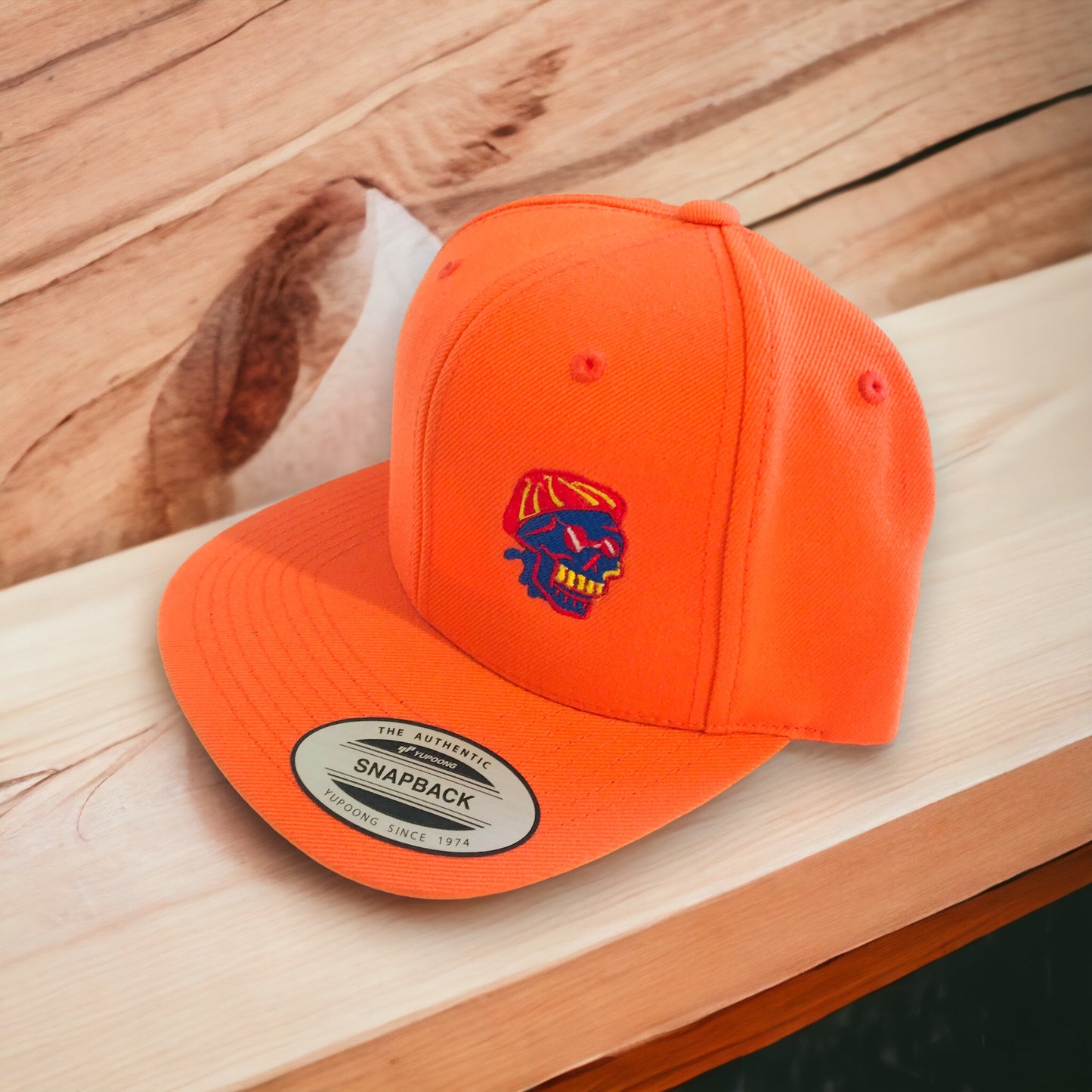 Orange flatpeak cap